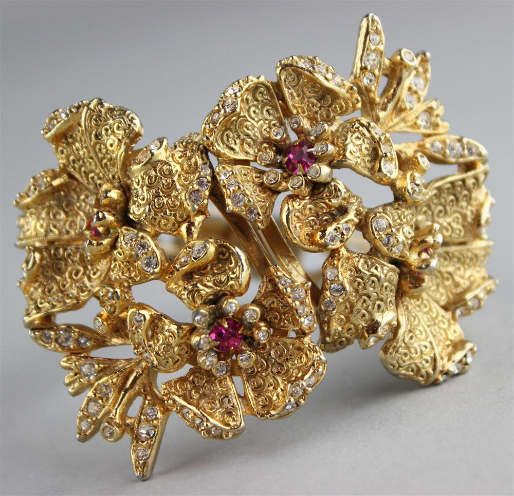 Appraisal: HOBE GOLD CUFF WITH RED AND COLORLESS RHINESTONES ON FLORAL