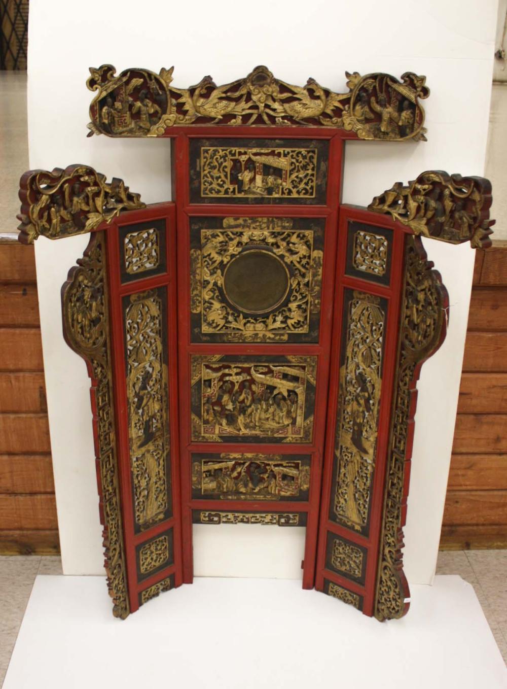 Appraisal: CHINESE THREE-PANEL CARVED GILTWOOD FLOOR SCREEN a floor screen in