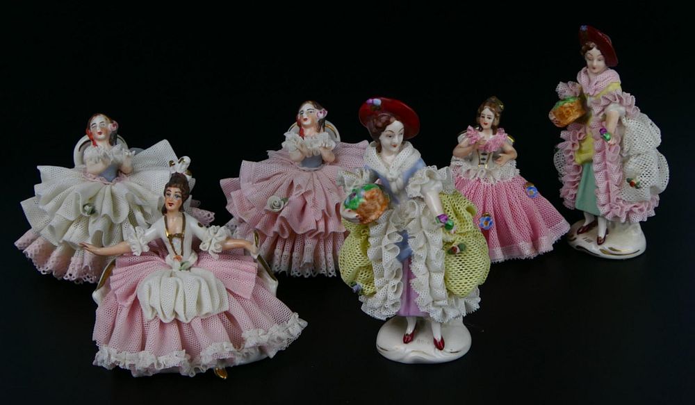 Appraisal: GROUPING OF DRESDEN PORCELAIN FIGURINES Tallest being all marked to