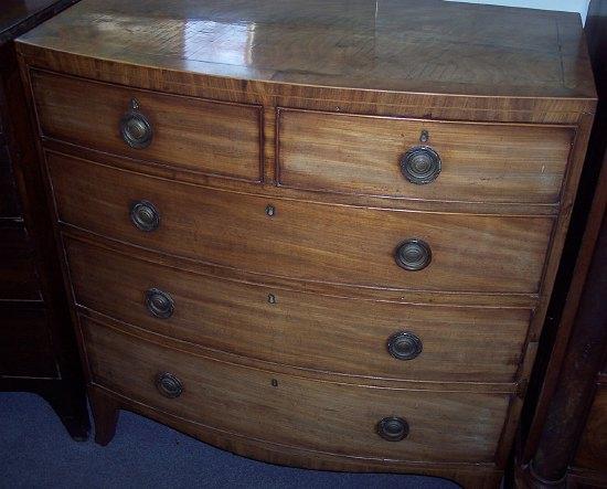 Appraisal: An early th Century mahogany bowfront chest fitted three long