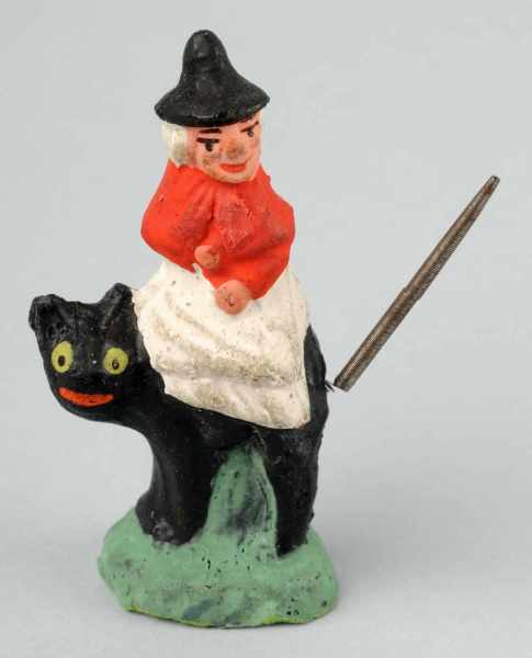 Appraisal: Composition Witch Riding Cat with Spring Tail Description Rare in