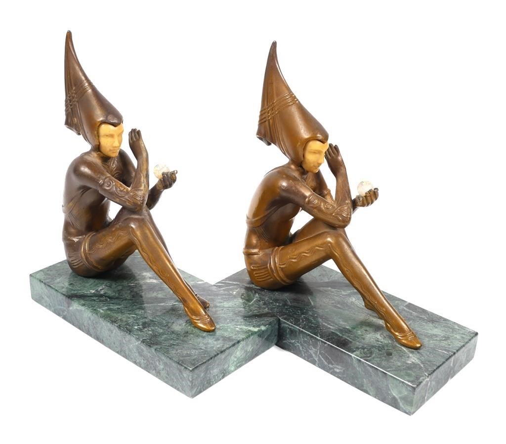 Appraisal: Antique pair of bookends designed originally by Henri Fugere made