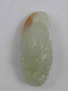 Appraisal: A Chinese jade carving of a parrot cm long