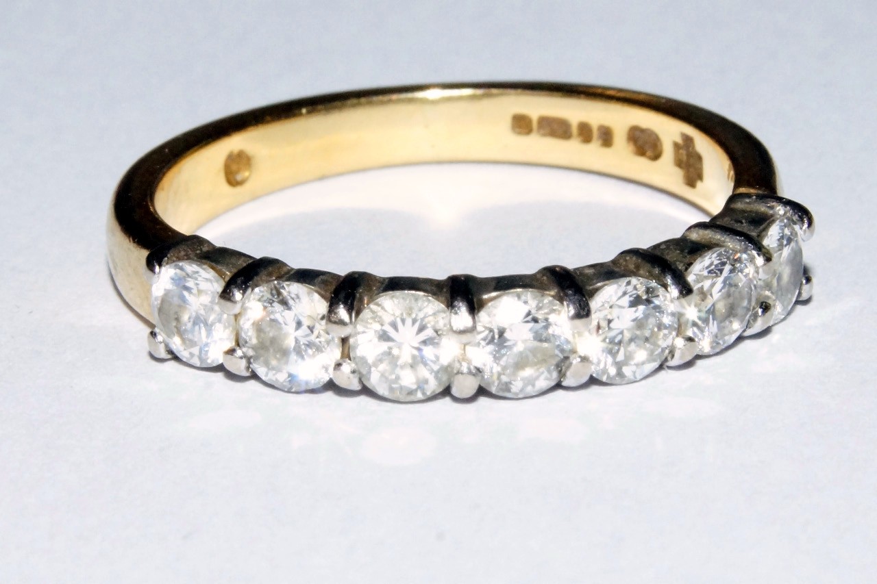 Appraisal: A modern ct gold and diamond half eternity ring with