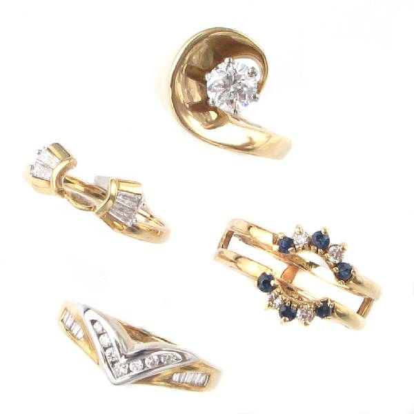 Appraisal: A collection of gem-set diamond and gold ring mounts and