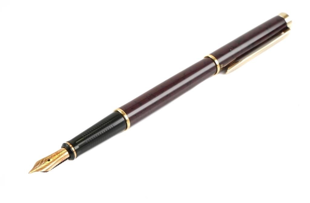 Appraisal: PELIKAN Marsala red gold trim K M nib fountain pen