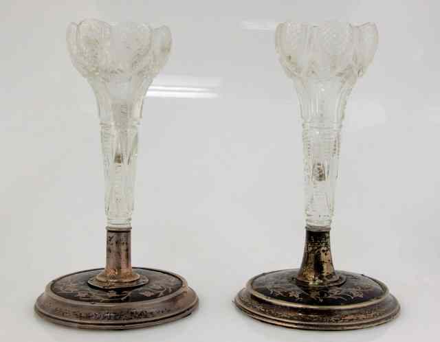 Appraisal: A pair of silver and tortoiseshell mounted bud vases the