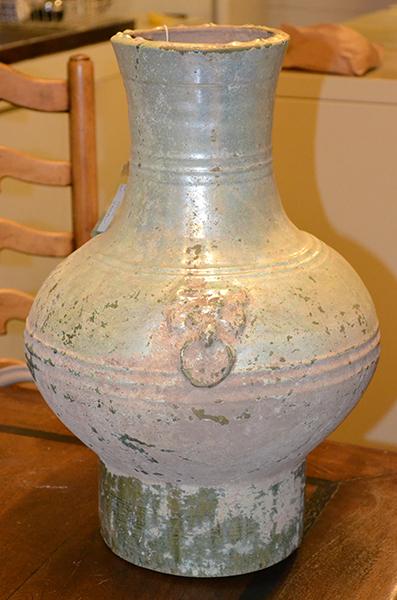 Appraisal: A HAN PERIOD GLAZED TERRACOTTA JAR of waisted form on