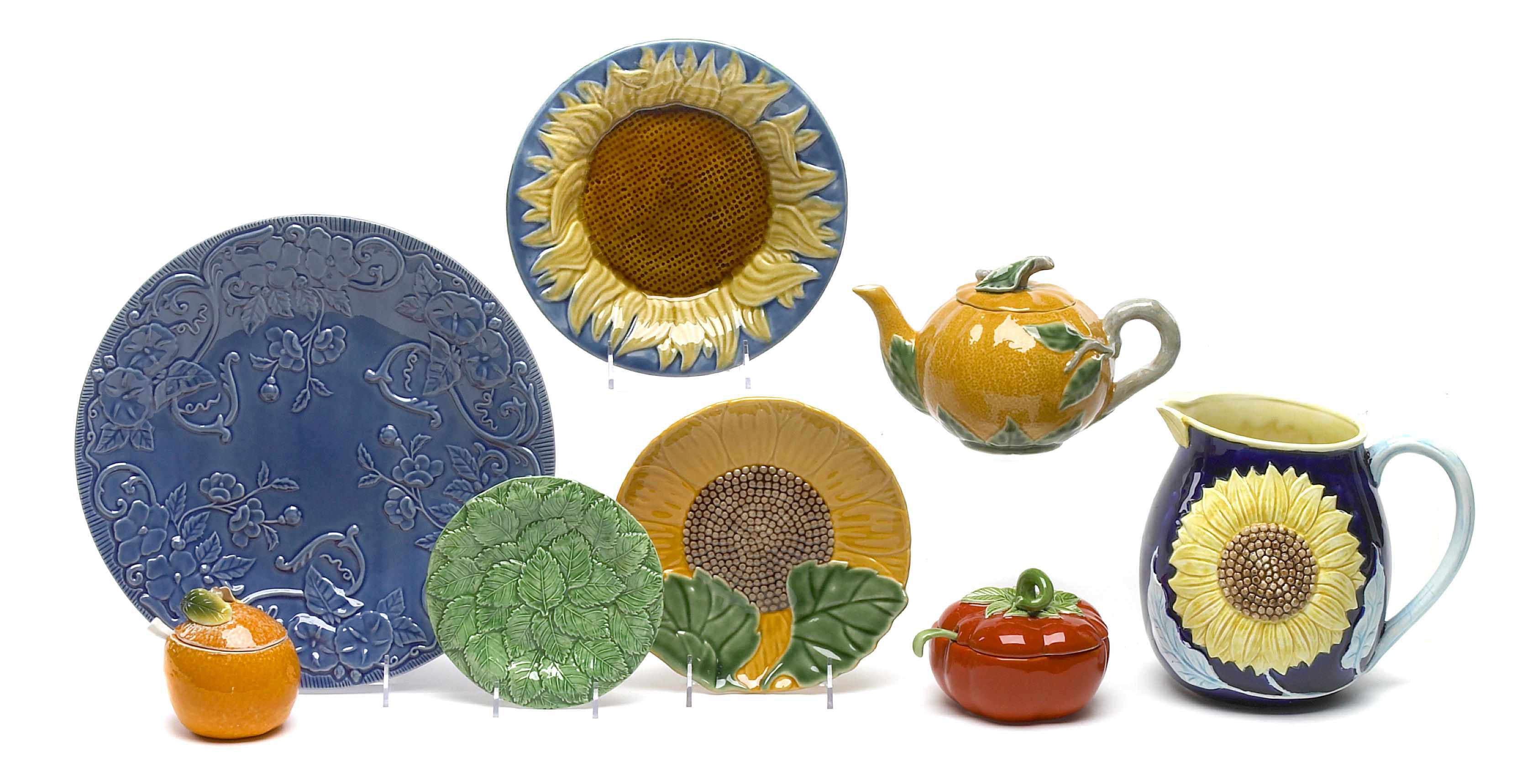 Appraisal: An assortment of paint decorated and glazed pottery dinnerware items