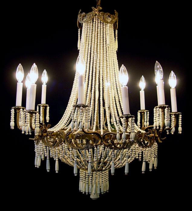 Appraisal: ELEGANT FRENCH EMPIRE STYLE WOOD BEAD CHANDELIER light ivory colored