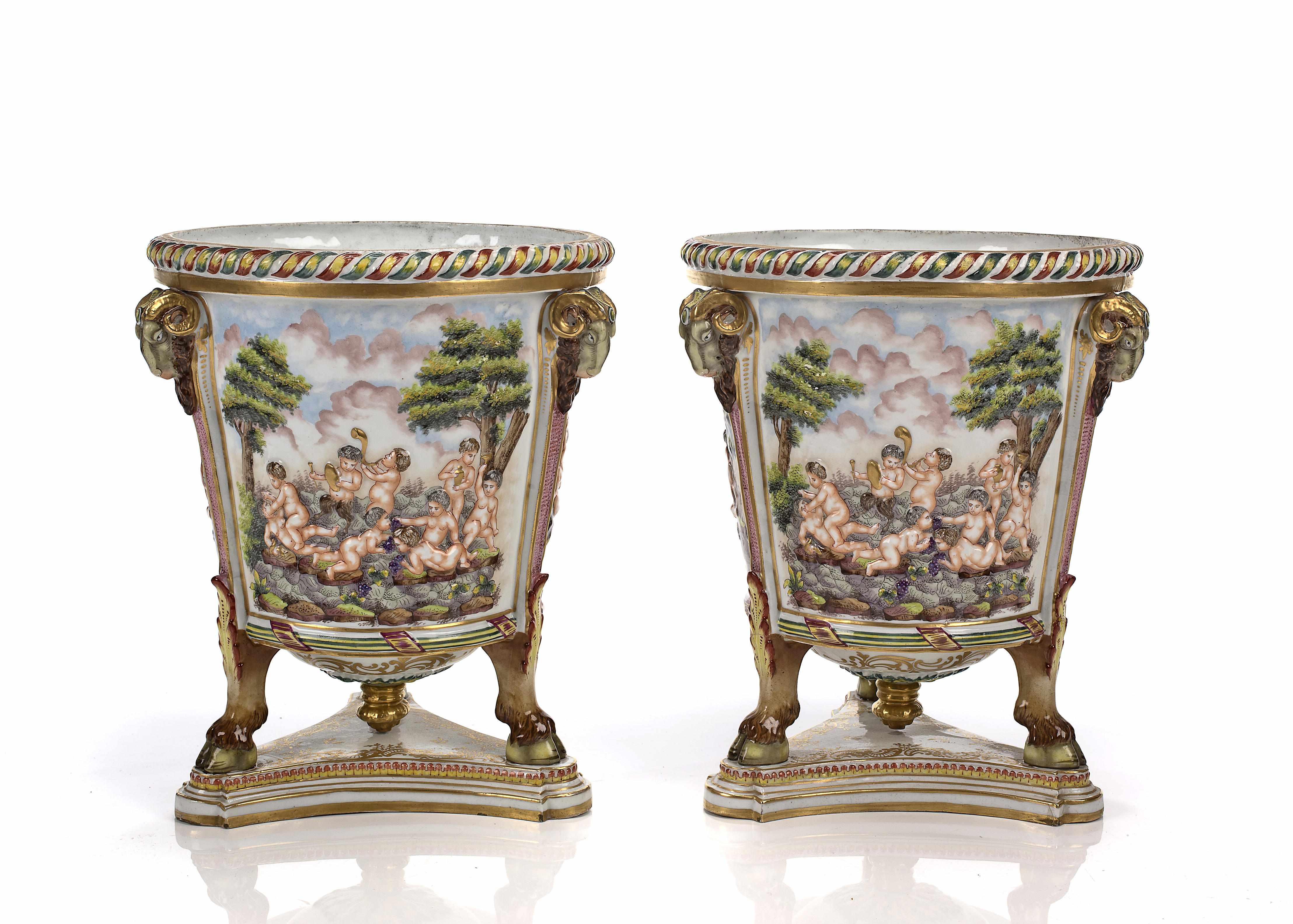 Appraisal: A pair of Capodimonte style porcelain urns height in diameter