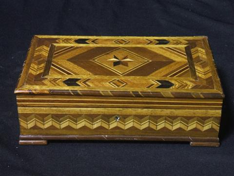 Appraisal: INLAID WOOD BOX Of rectangular shape with geometric inlaid wood