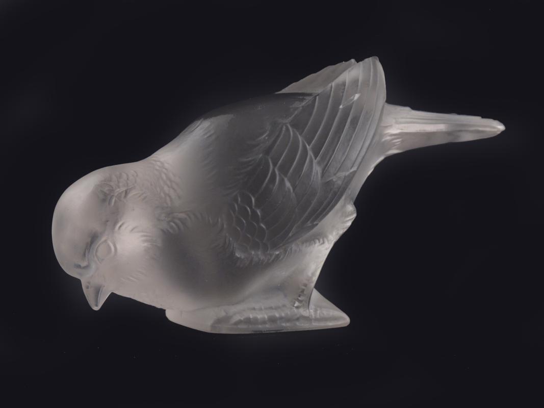 Appraisal: A Lalique clear and frosted glass bird table centrepiece