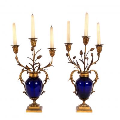 Appraisal: A pair of blue glass and gilt metal mounted table