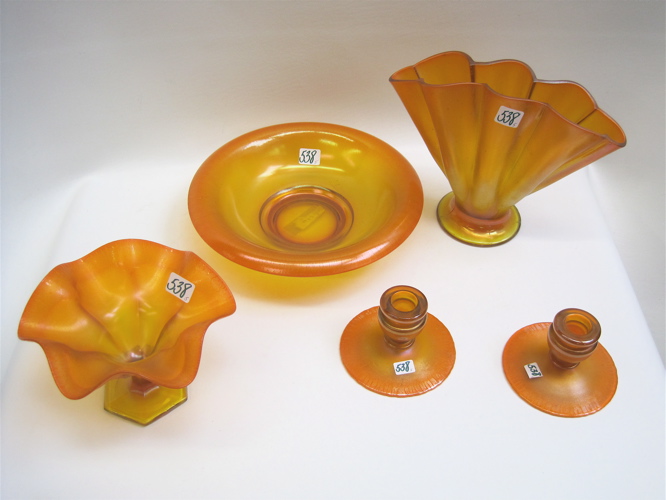 Appraisal: FIVE PIECES TANGERINE ORANGE STRETCH GLASS bowl D vase H