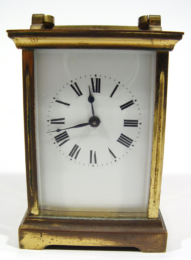 Appraisal: Brass carriage clock with enamel dial and swing handle cm