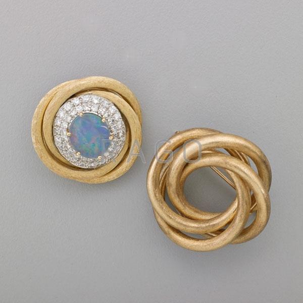 Appraisal: TWO BRUSHED K YELLOW GOLD KNOT BROOCHES Condition Report