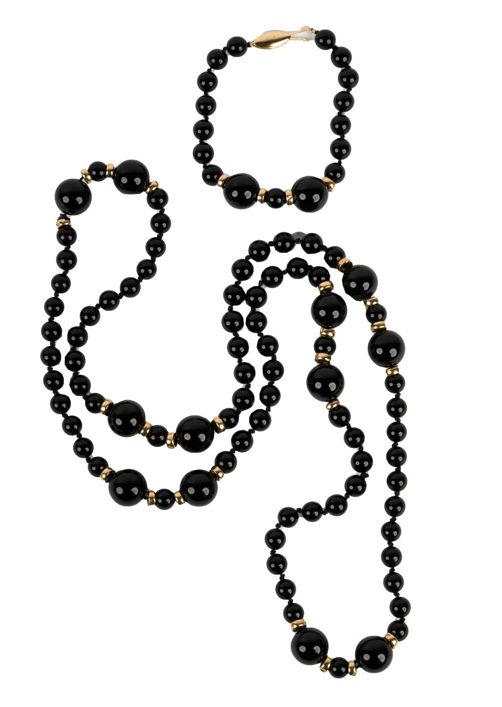 Appraisal: KARAT YELLOW GOLD ONYX BEADED NECKLACE BRACELETthe necklace containing round