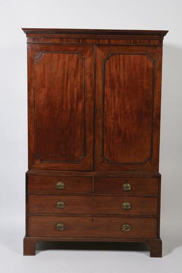 Appraisal: A GEORGE III MAHOGANY LINEN PRESS with a dentil moulded