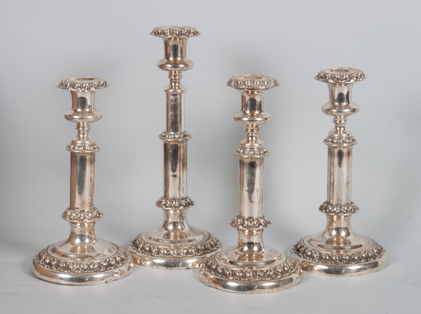 Appraisal: Set of four silver-plated adjustable candlesticks adjusts from in to