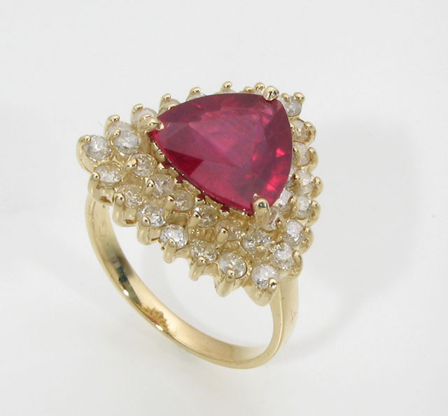 Appraisal: RUBY DIAMOND AND FOURTEEN KARAT GOLD RING featuring a single