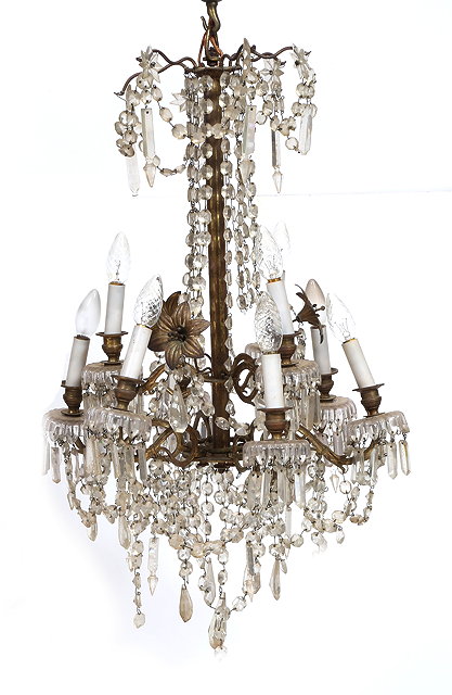 Appraisal: AN OLD HANGING NINE-LIGHT ELECTROLIER with gilt metal lily flowers