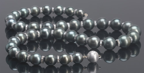 Appraisal: Tahitian black pearl necklace with diamonds and k wg rondelles