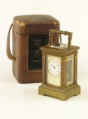 Appraisal: A French th century gilt brass miniature carriage clock by