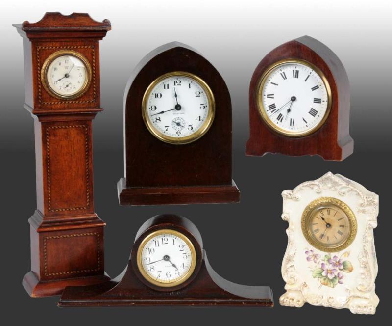 Appraisal: Lot of Small Clocks Description Includes one tall case clock