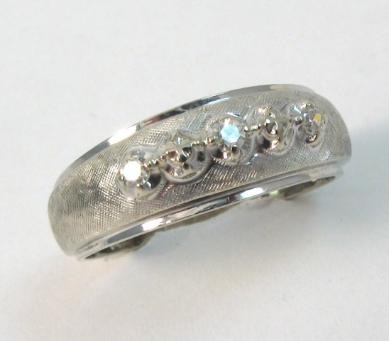 Appraisal: MAN'S DIAMOND AND WHITE GOLD RING k gold and set