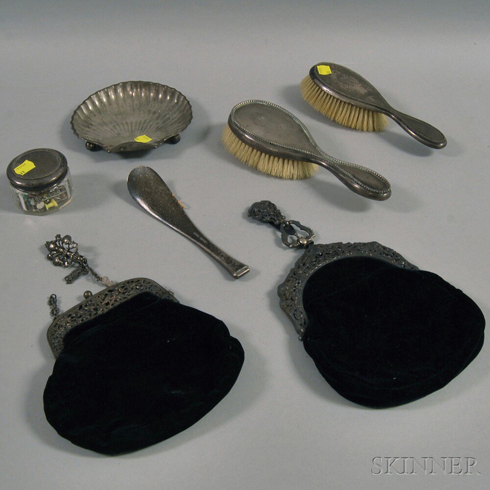 Appraisal: Seven Accessory and Desk Items two hairbrushes a sterling silver