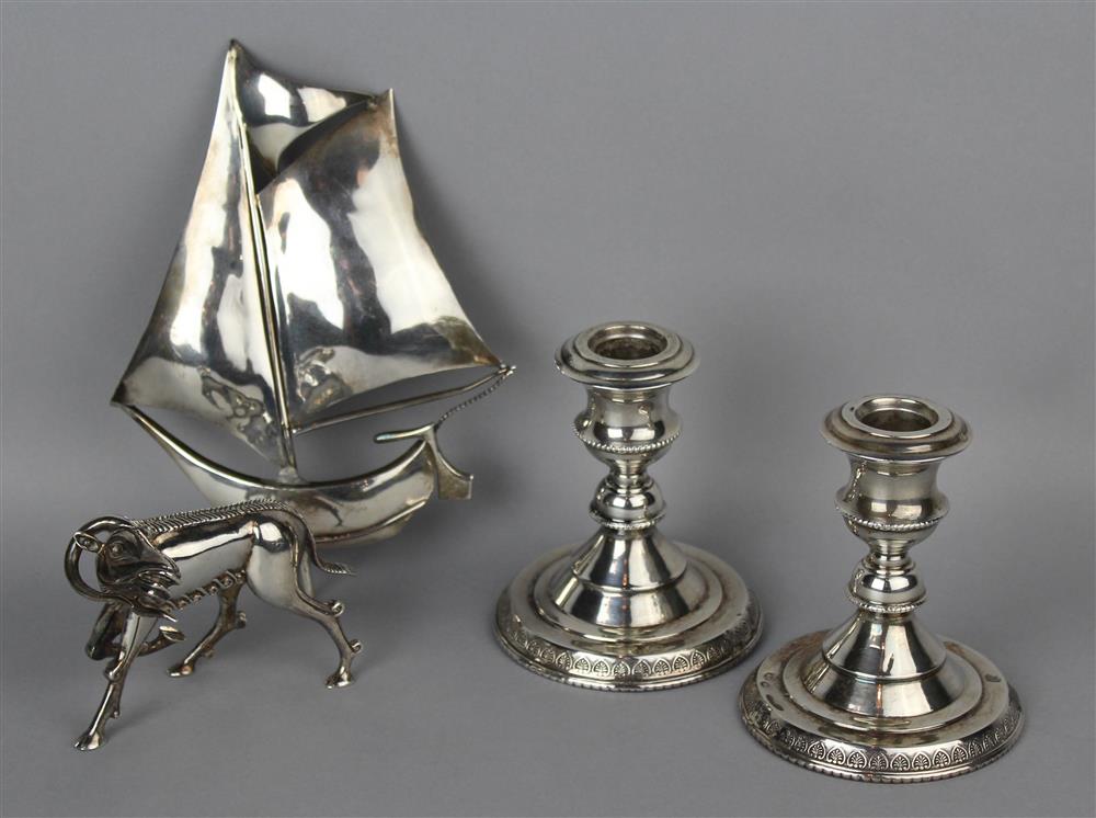 Appraisal: ILIAS LALAOUNIS STERLING RAM AND STERLING SAILBOAT WITH A PAIR