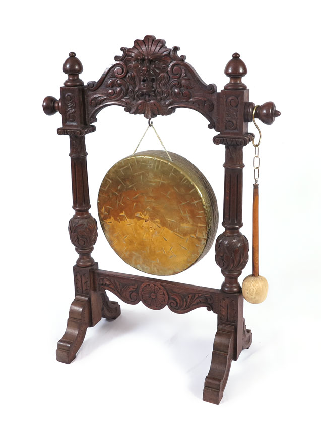 Appraisal: CARVED ASIAN FLOOR GONG Profusely carved frame featuring masqueron foliate