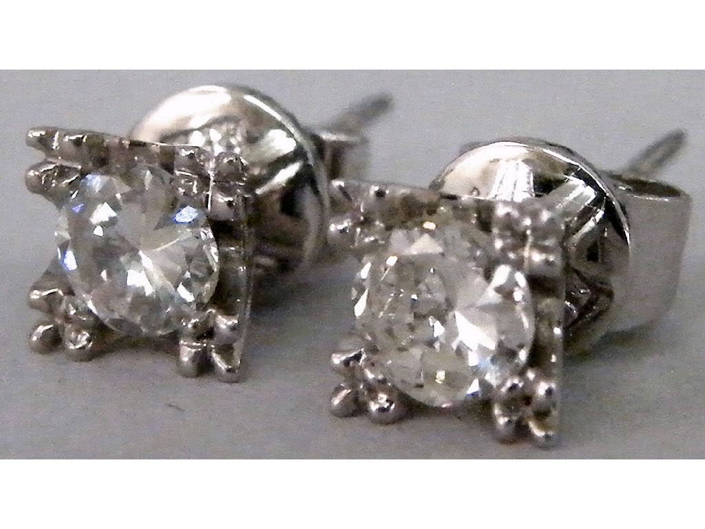 Appraisal: Pair of k white gold diamond solitaire earstuds brilliant cut