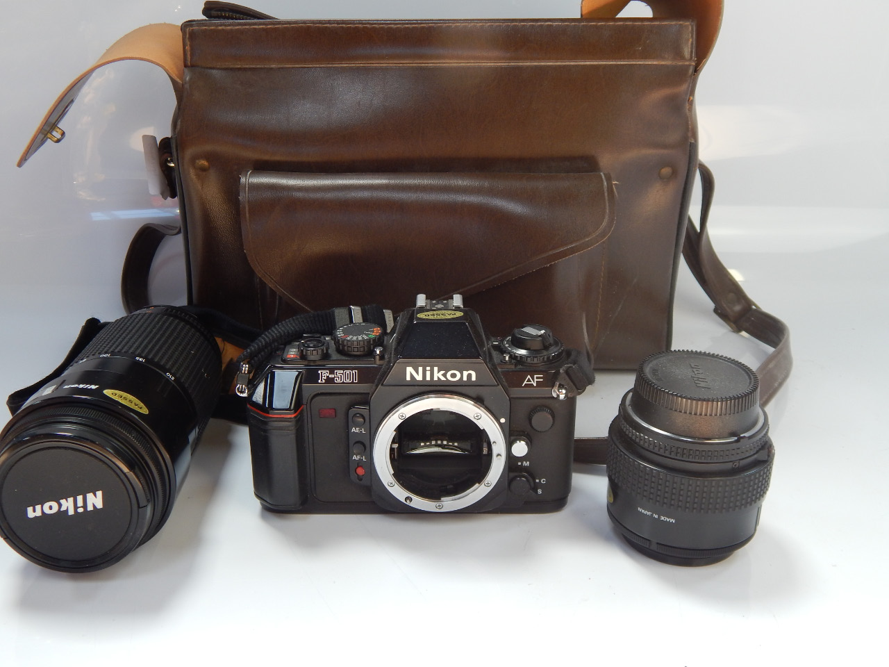 Appraisal: A Nikon F SLR camera with assorted lens including a