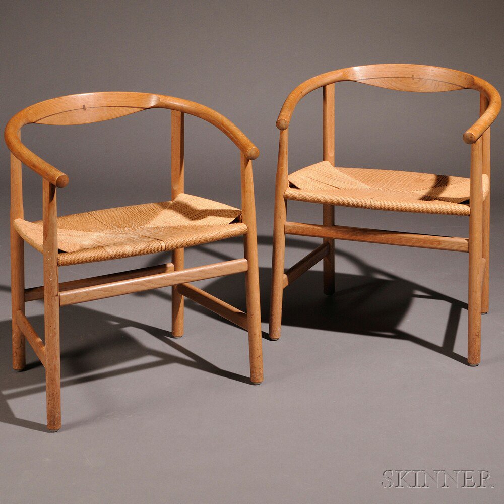 Appraisal: Two Danish Modern Oak Armchairs mid- th century each curved