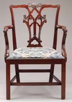 Appraisal: MAHOGANY CHIPPENDALE STYLE ARMCHAIR The large armchair has excellent carved