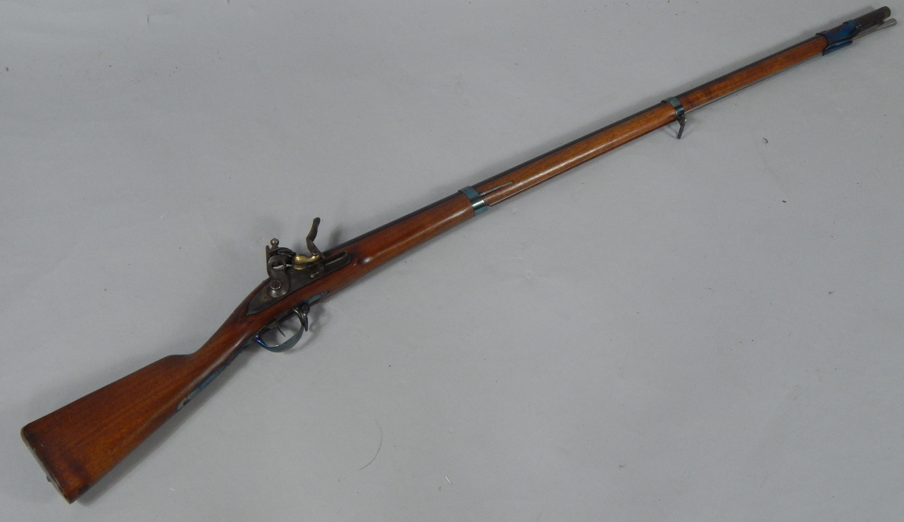 Appraisal: A replica Charleville musket stamped St Etienne to lock plate