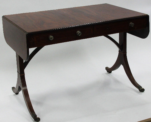 Appraisal: A Regency mahogany sofa table fitted two drawers on end