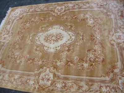 Appraisal: A CHINESE WASHED AND FRINGED CARPET the camel field with