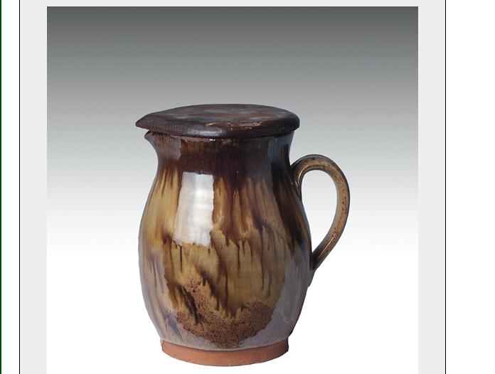 Appraisal: MASSACHUSETTS OR MAINE GLAZED REDWARE PITCHER WITH WOOD MAKE-DO COVER