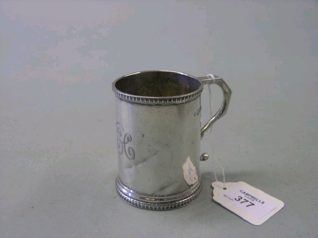 Appraisal: A silver christening mug tapering form with bead-and-billet borders London