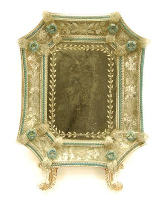 Appraisal: A Venetian dressing table mirror the rectangular canted plate with