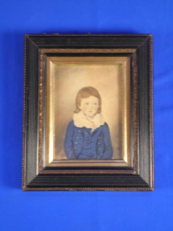 Appraisal: An early th C schoolBoy in blue coatWatercolour miniature cm