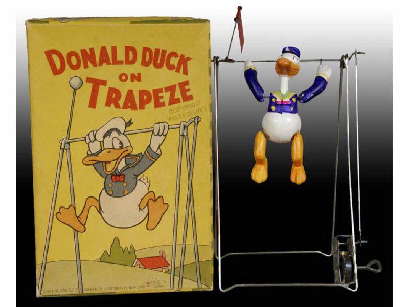 Appraisal: Walt Disney Celluloid Donald Duck Trapeze Toy with Description Toy