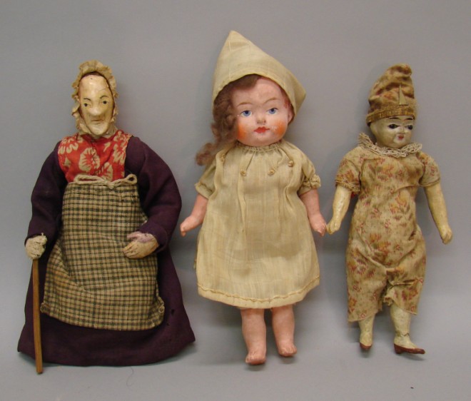 Appraisal: Lot of unmarked papier mache dolls Lady with painted features