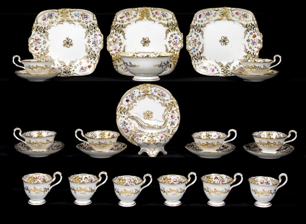 Appraisal: A COALPORT TEA AND COFFEE SERVICE painted with colourful sprays