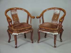 Appraisal: A pair of Chinese hardwood and inlaid ivory horseshoe shaped