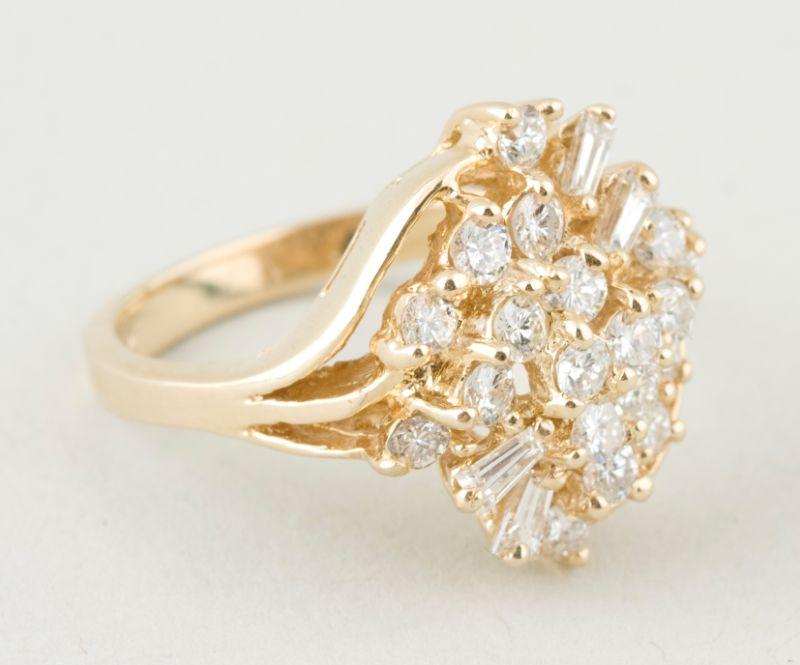 Appraisal: KT Yellow Gold Diamond Cluster Ring with round brilliant cut