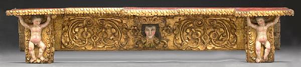 Appraisal: A Mexican Colonial painted and parcel gilt overdoor shelf th